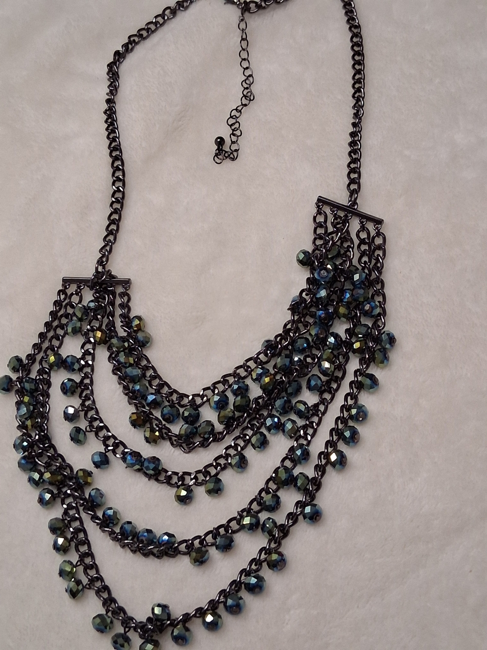Premier Designs Gunmetal Multistrand Necklace with Irridescent Blue Crystal.